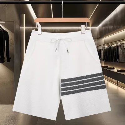 Thom Browne Shorts replika lyx bl?£¤ vit gr?£¤ stickad logotyp