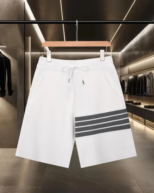 Thom Browne Shorts replika lyx bl?£¤ vit gr?£¤ stickad logotyp